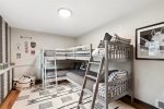 The bunk room is cozy and inviting. Perfect for children and young adults.
